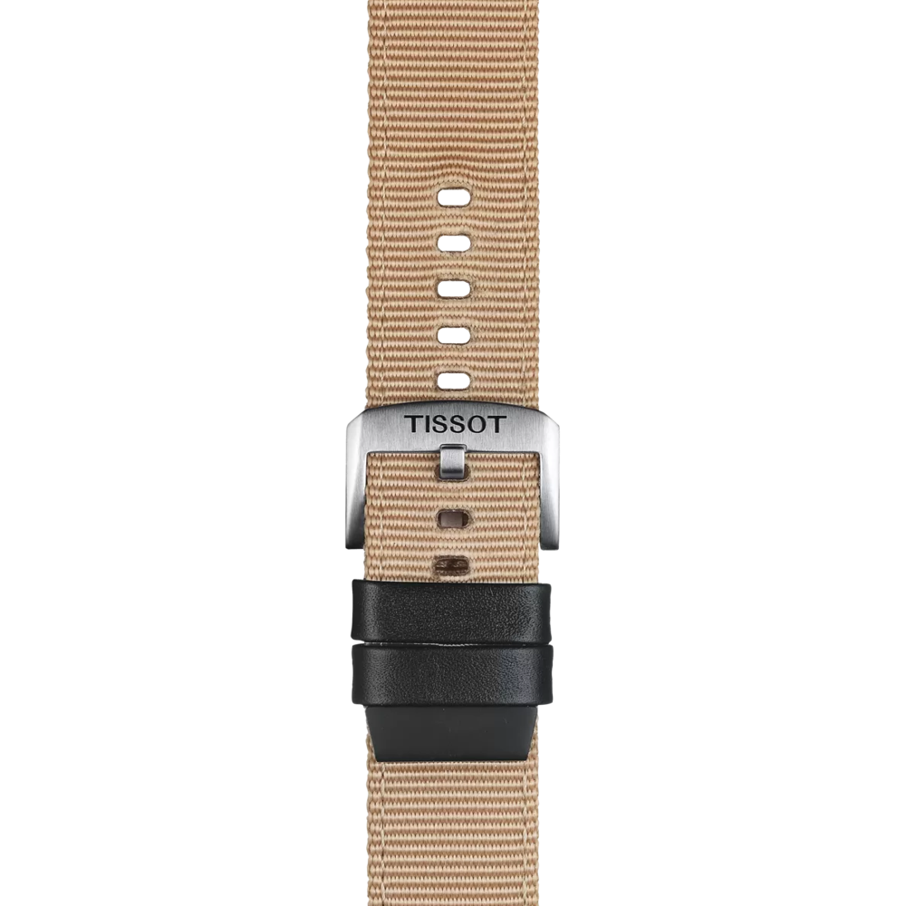 A close-up of the Tissot Official Beige Fabric Strap (Lugs 22 mm) featuring a silver buckle engraved with "TISSOT" and a black leather loop. The beige fabric strap by Tissot has multiple adjustment holes and is displayed against a white background.