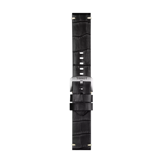 The Tissot Official Black Leather Strap Lugs 22 mm features black leather with a crocodile pattern, a silver buckle engraved with "TISSOT," and multiple adjustment holes. The strap is displayed vertically on a plain white background.