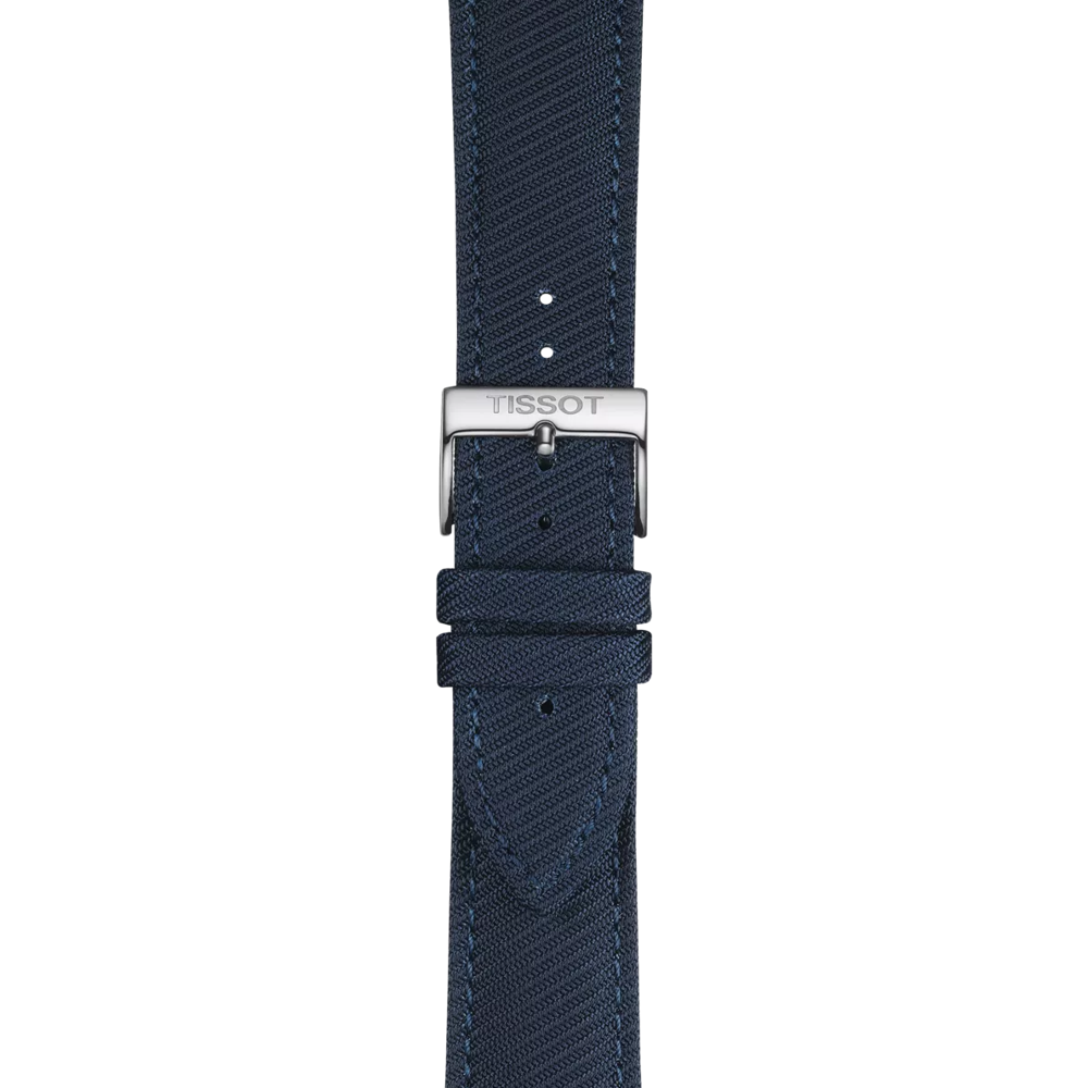 A close-up of the Tissot Official Blue Textile Strap Lugs 22 mm, featuring a navy blue fabric material and a silver buckle engraved with the Tissot brand name, displayed on a white background.