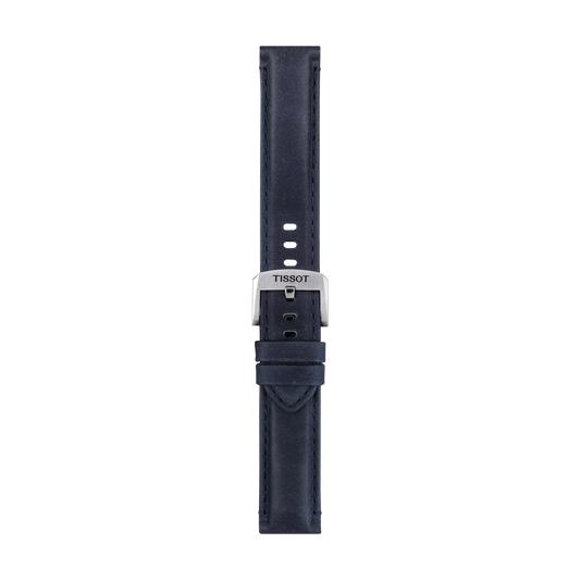 The Tissot Official Blue Leather Strap Lugs 20 mm features a rich navy blue leather design with white stitching and a silver buckle engraved with "TISSOT," displayed vertically on a white background.