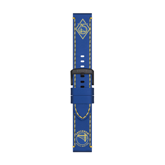 The Tissot Official Blue Leather Strap Lugs 22 mm features yellow stitching, the Golden State Warriors logo near the tip, and another team logo near the top. The black buckle is branded with “Tissot.” The background is white.