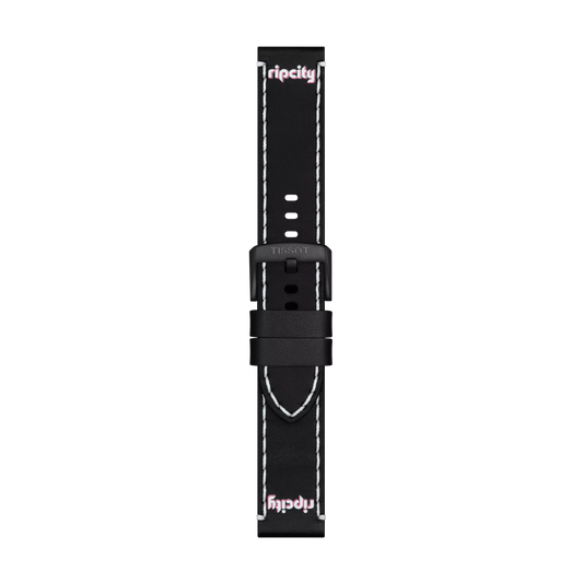 Featuring the Tissot Official Black Leather Strap (Lugs 22 mm), this black strap showcases white stitching and displays "ripcity" in white and pink at both ends. The black buckle is engraved with "TISSOT." The strap, by Tissot, is presented vertically against a white background.