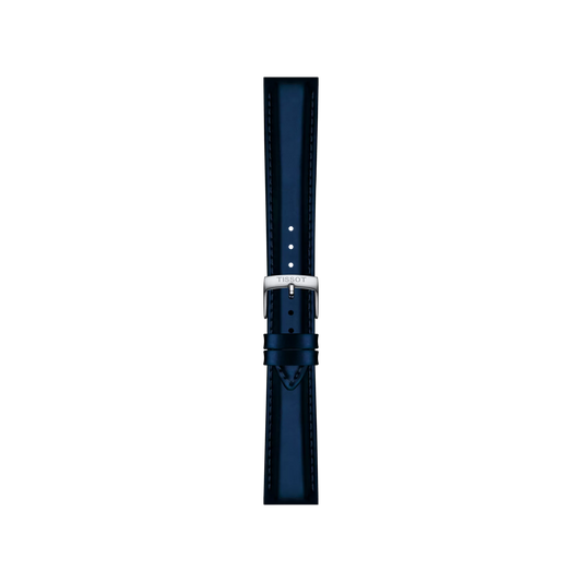 A Tissot Official Blue Synthetic Strap with 18mm lugs, featuring white stitching, a silver buckle, and multiple adjustment holes, is displayed vertically against a plain white background.
