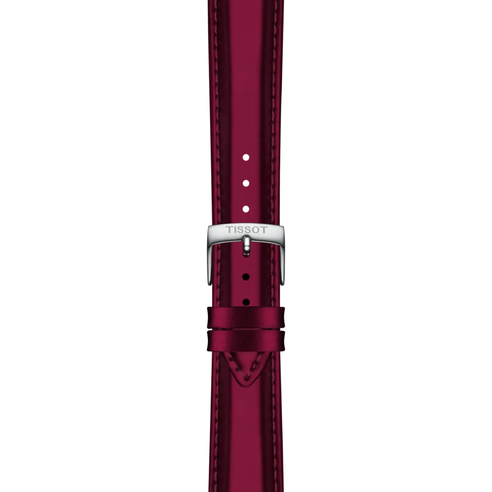 A Tissot Official Red Synthetic Strap with 18 mm lugs, featuring stitched edges and a silver buckle engraved with "TISSOT," displayed against a white background.