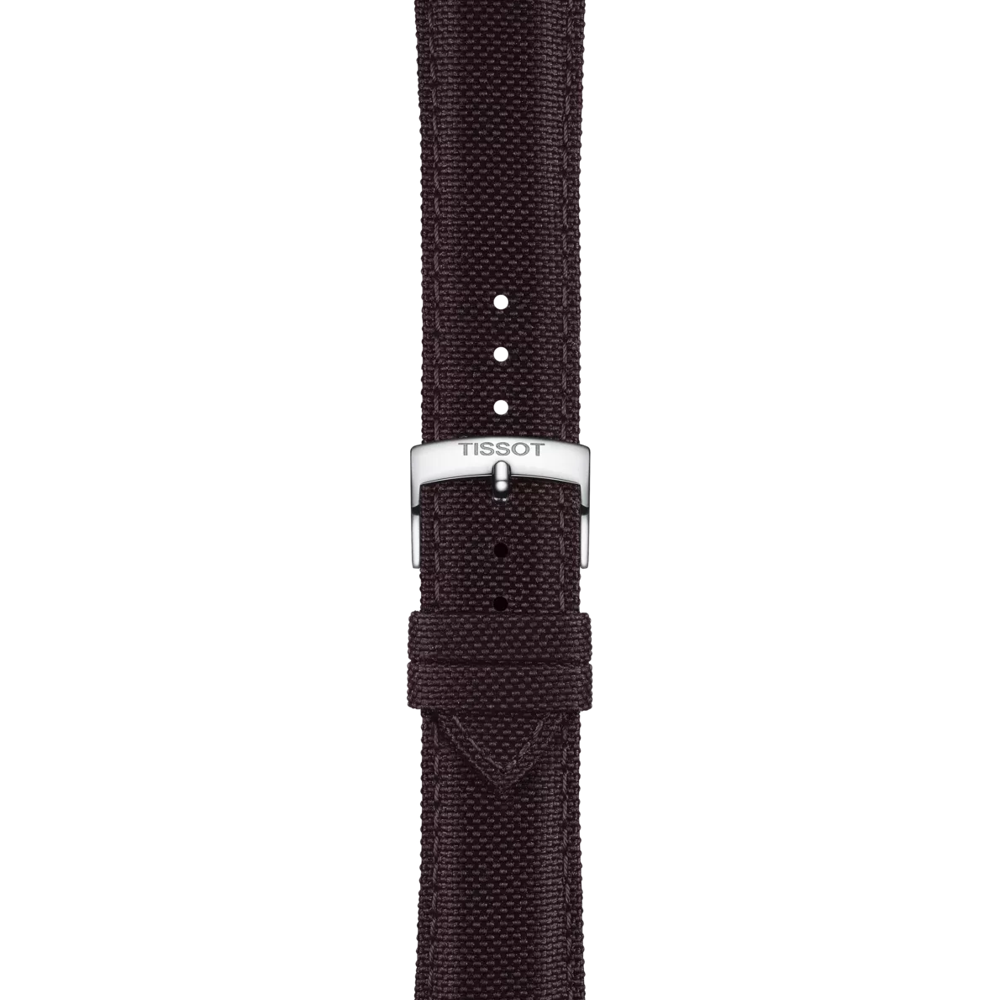 A close-up of the Tissot Official Brown Fabric Strap with 21 mm lugs, featuring a silver buckle engraved with "TISSOT," displayed against a plain white background.