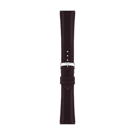 The Tissot Official Brown Fabric Strap Lugs 21 mm is a dark brown textured watch strap with a silver buckle, featuring the Tissot logo. The strap is displayed vertically on a plain white background.