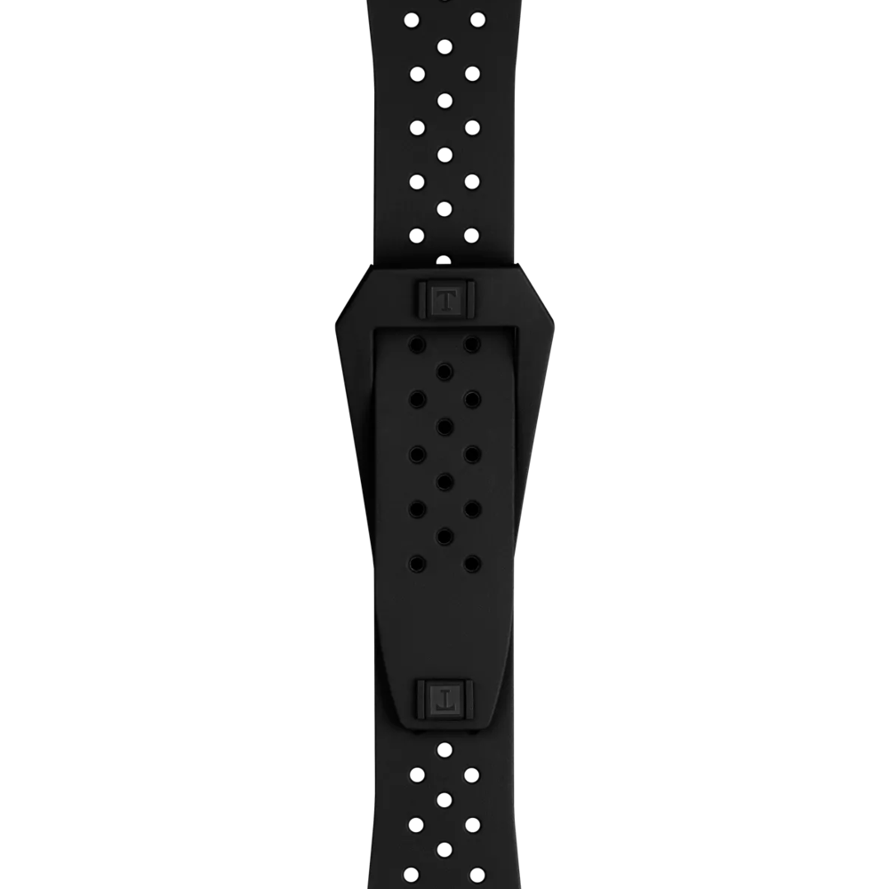 A close-up of the Tissot Official Black Sideral Rubber Strap by Tissot, featuring a black perforated design, rectangular clasp, and multiple adjustment holes, displayed vertically against a plain white background.