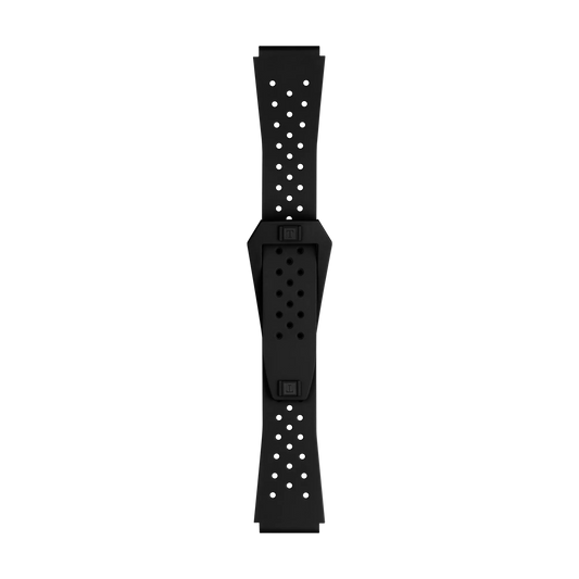 The Tissot Official Black Sideral Rubber Strap by Tissot features a black perforated wristband with multiple small holes and a rectangular centerpiece, displayed on a plain white background.
