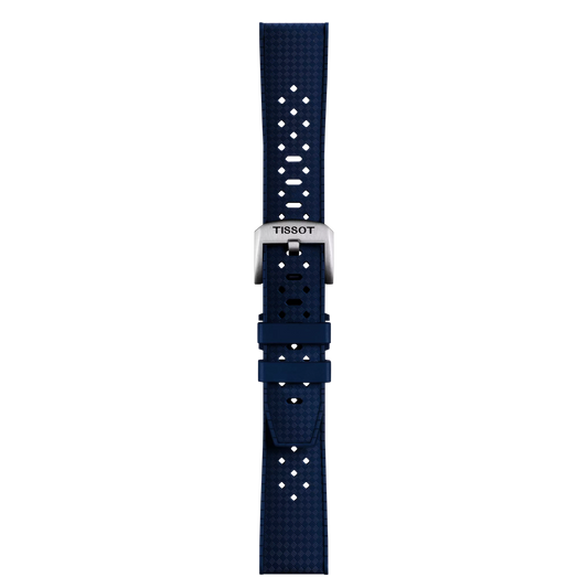 The Tissot Official Blue Rubber Strap (Lugs 20mm) by Tissot features a textured blue silicone design with multiple adjustment holes and a silver buckle engraved with "Tissot," displayed vertically against a plain light gray background.