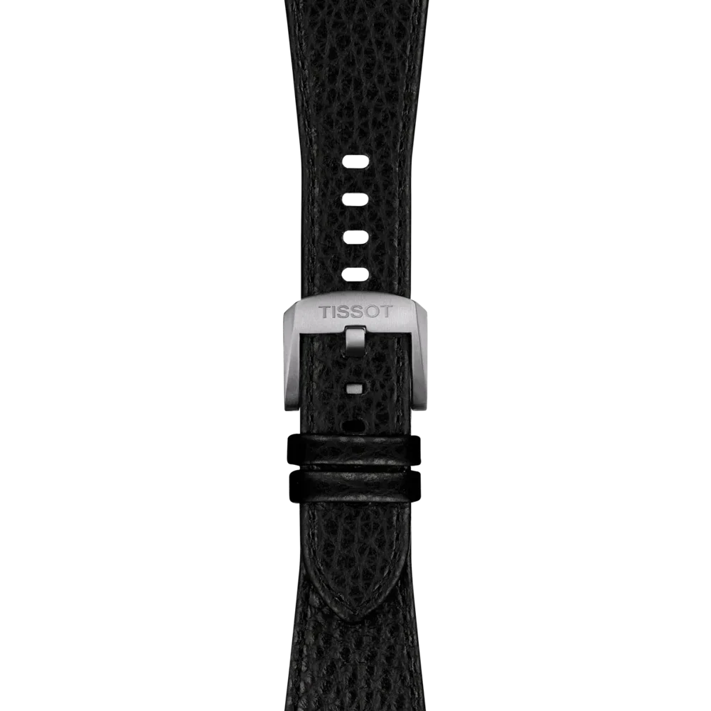 Close-up of the Tissot Official PRX 40mm Black Leather Strap, featuring a black textured leather band and a silver buckle engraved with "TISSOT," displayed against a plain light background.