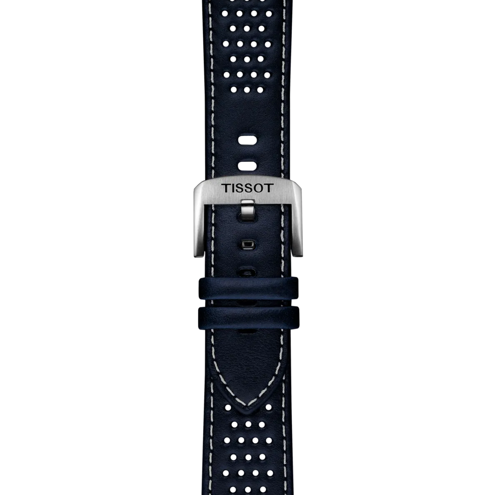 A Tissot Official Blue Leather Strap Lugs 22mm, featuring navy blue leather with white stitching and perforated holes, and a silver buckle engraved with the Tissot brand name, displayed on a plain white background.