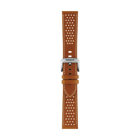 The Tissot Official Light Brown Leather Strap Lugs 22mm features a light brown leather construction with white stitching and small perforations. It is completed with a silver buckle engraved with "TISSOT" and is displayed against a plain white background.