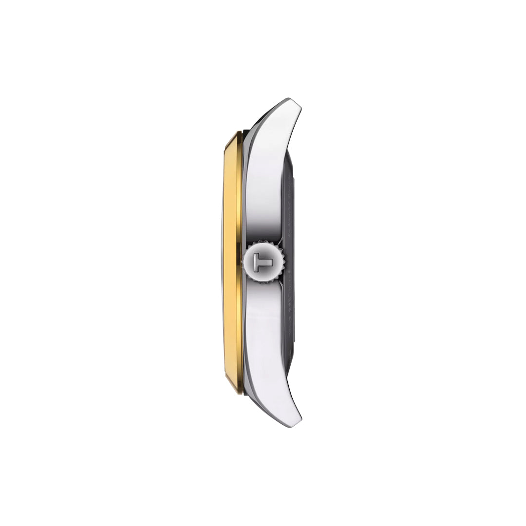 A close-up side view of the Tissot Gentleman Powermatic 80 Automatic 40mm Watch with an 18K gold bezel and scratch-resistant sapphire crystal, photographed on a white background.