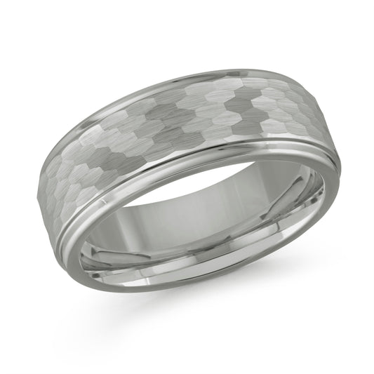 The Malo Tungsten 8mm Wedding Band showcases a sophisticated, modern design with its textured hexagonal pattern encircling the silver tungsten band. The smooth, polished interior and beveled edges enhance its style, echoing the signature appearance of Malo's men's ring collections.