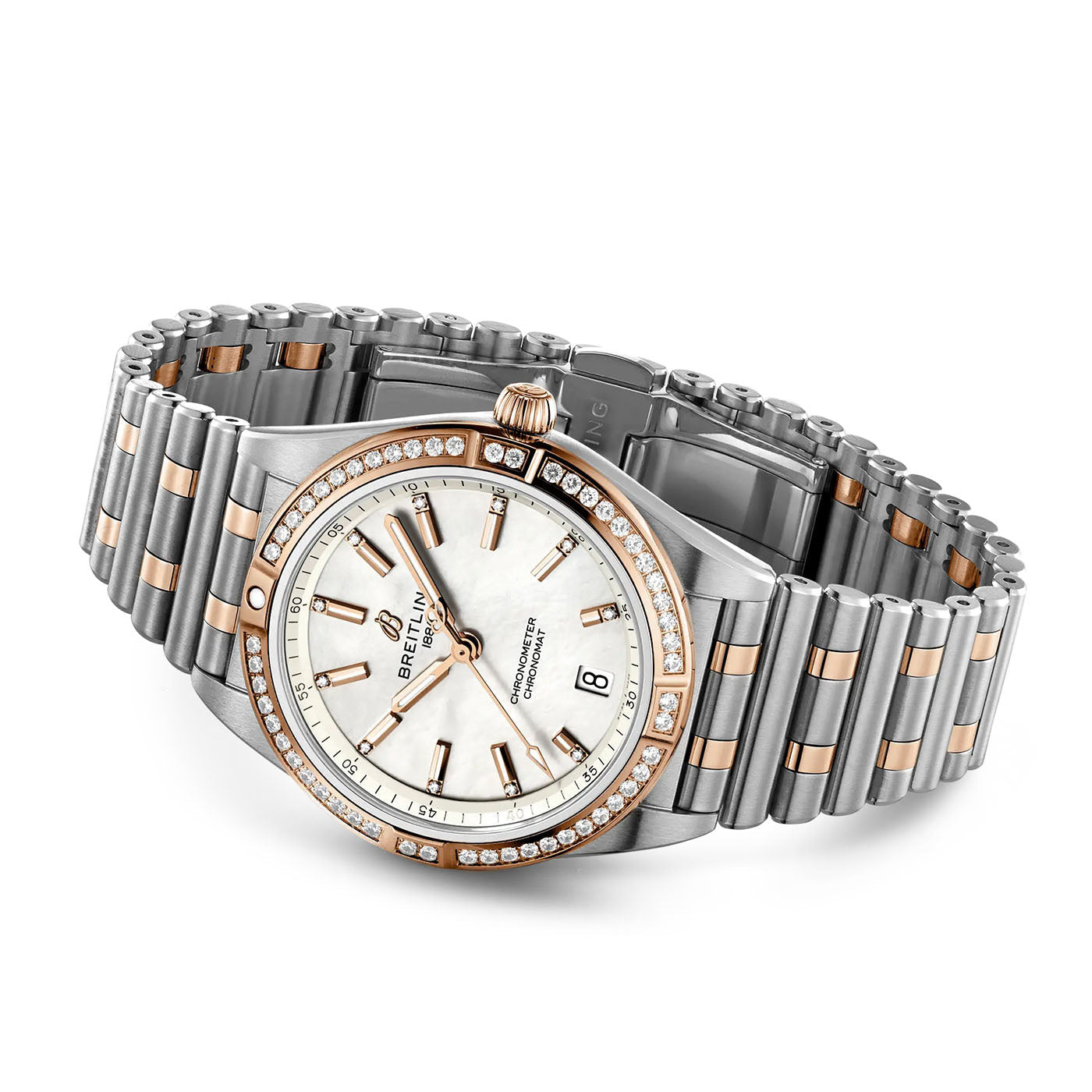 The BREITLING Chronomat Automatic 36 by Breitling features a luxurious silver and rose gold metal bracelet, complemented by a round face with a mother-of-pearl dial and diamond-accented bezel. It includes gold hour markers and hands, a date display at the 3 o'clock position, and proudly showcases the renowned Breitling name on its face.