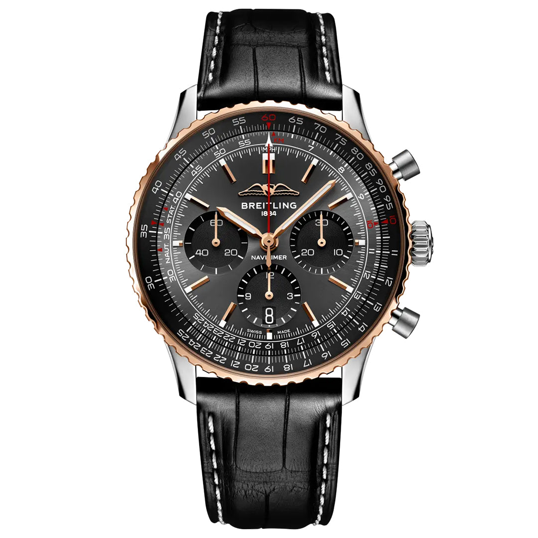 The Breitling Navitimer B01 Chronograph 43 Limited Edition is a luxury pilot’s watch featuring a black dial, three subdials, silver and rose gold bezel, and a black leather strap with white stitching.
