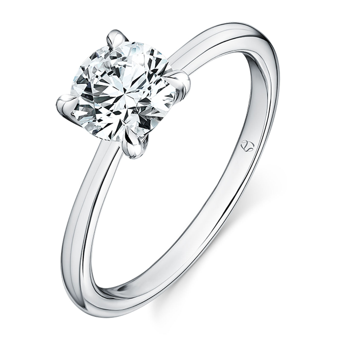 Introducing the Hearts On Fire Vela Platinum Semi Mount Solitaire Engagement Ring, showcasing a round diamond securely held by four prongs on a sleek platinum band, highlighting its brilliance and simplicity.