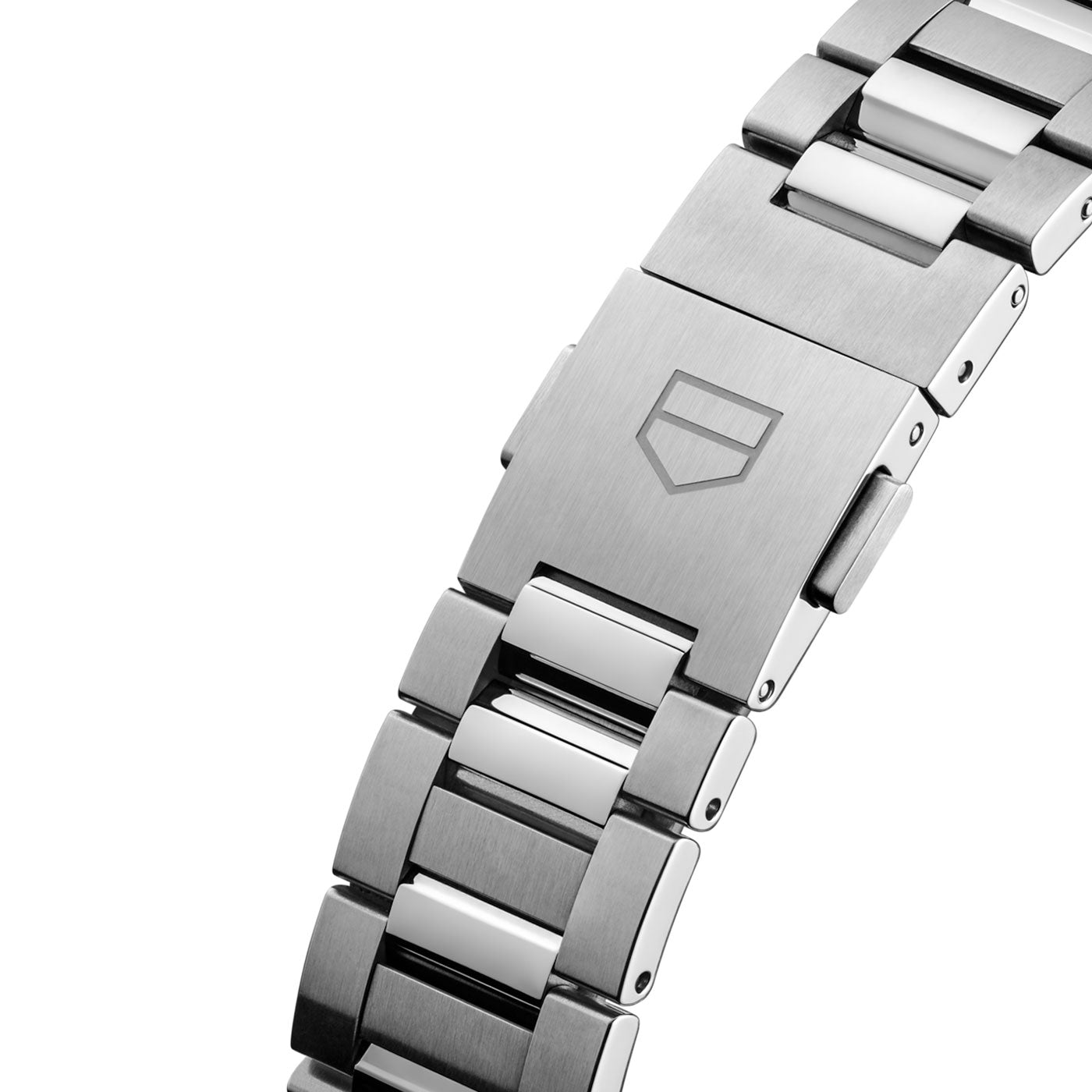 Close-up of the TAG Heuer Carrera Date Automatic 36mm Watch’s stainless steel bracelet, showcasing an elegant mix of brushed and polished finishes. The clasp is adorned with an engraved shield logo, perfectly accentuating the refined 36mm case from TAG Heuer, which is powered by the precision Caliber 7 Automatic movement.