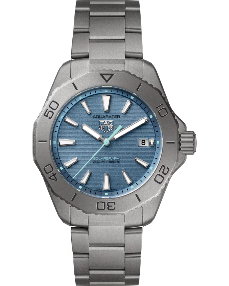 The TAG Heuer Aquaracer Professional 200 Solargraph Solar Quartz 40mm Watch features a blue textured dial, silver hour markers, a date window at 3 o’clock, and a sleek silver metal bracelet.