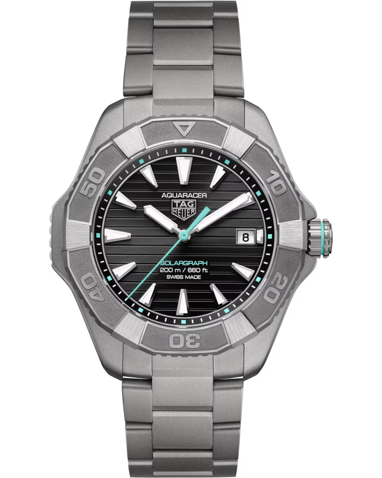 A TAG Heuer Aquaracer Professional 200 Solargraph Solar Quartz 40mm watch featuring a black dial with silver markers, turquoise accents, a date display at 3 o’clock, and a metal bracelet.
