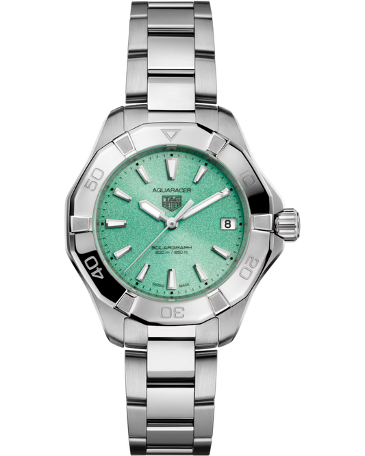 A TAG Heuer Aquaracer Professional 200 Solargraph Solar Quartz 34mm watch, featuring a green textured dial with silver hour markers, a date window at 3 o’clock, and a stainless steel bracelet.