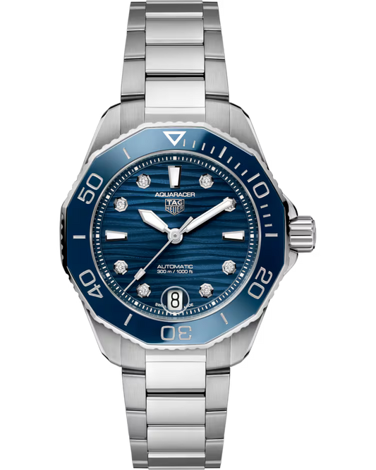A TAG Heuer Aquaracer Professional 300 Date Automatic 36mm watch featuring a blue dial with diamond hour markers, a date window at 6 o’clock, and a stainless steel bracelet.
