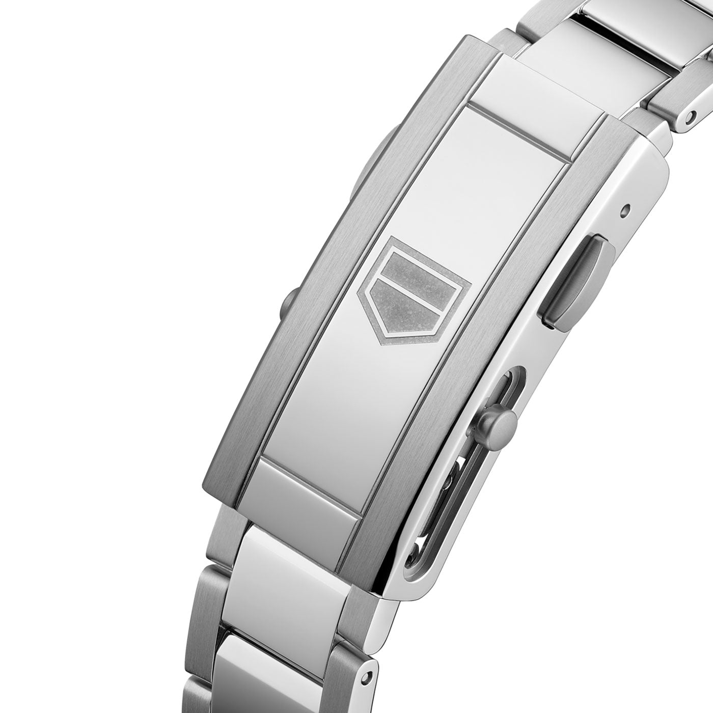 Close-up of a silver metal watch clasp featuring a geometric shield logo engraved on its surface, seamlessly connected to a matching silver bracelet—an elegant detail of the TAG Heuer Aquaracer Professional 300 Date Automatic 36mm Watch by TAG Heuer.