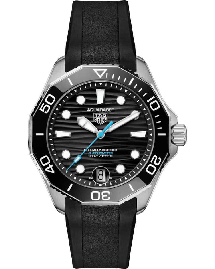 The TAG Heuer Aquaracer Professional 300 Date Automatic 42mm Watch features a black bezel, black dial with white markers, a blue second hand, a date window at 6 o’clock, and comes on a black rubber strap.