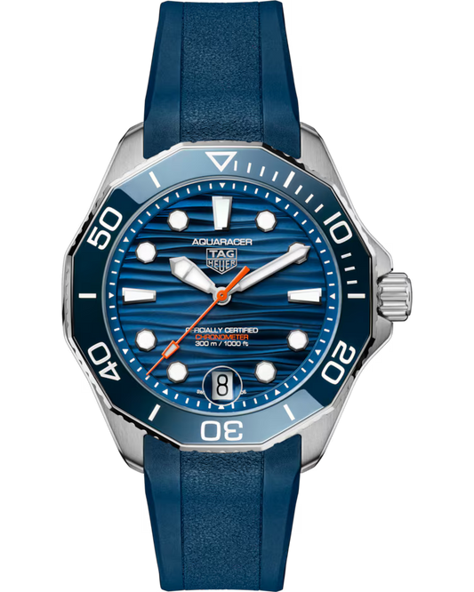 The TAG Heuer Aquaracer Professional 300 Date Automatic 42mm Watch features a striking blue striped dial complemented by silver hour markers, a blue bezel, and a matching blue rubber strap. It includes a date window at the 6 o’clock position and is water resistant up to 300 meters.