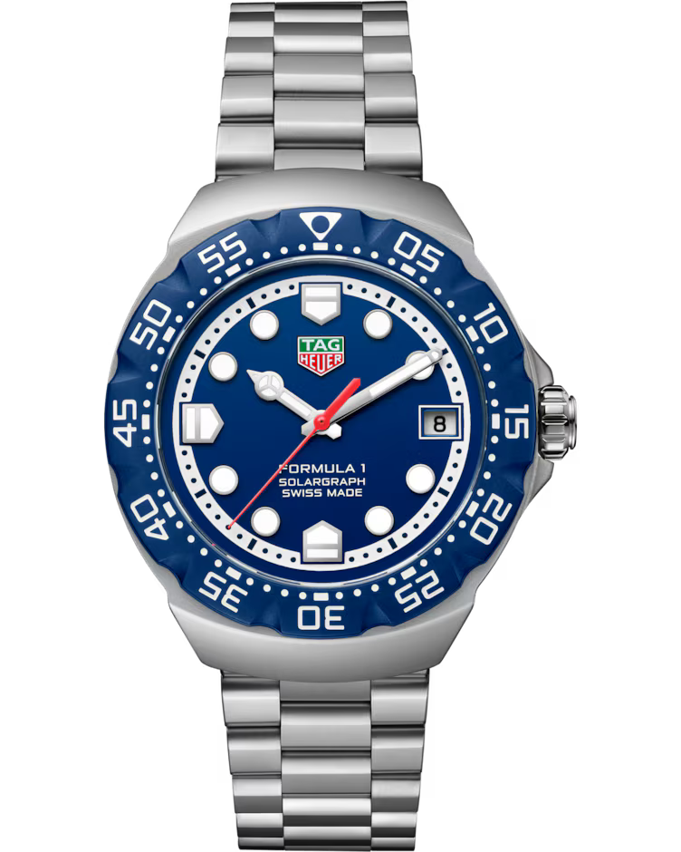 A TAG Heuer Formula 1 Solargraph Solar Quartz 38mm watch featuring a silver metal link bracelet, blue bezel, blue dial with white markers, date display at 3 o’clock, and labeled “Solargraph” and “Swiss Made.”.