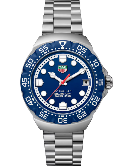 A TAG Heuer Formula 1 Solargraph Solar Quartz 38mm watch featuring a silver metal link bracelet, blue bezel, blue dial with white markers, date display at 3 o’clock, and labeled “Solargraph” and “Swiss Made.”.