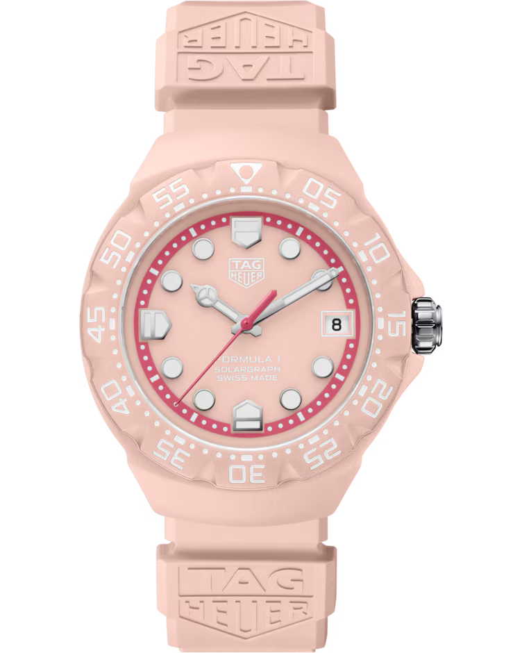 The TAG Heuer Formula 1 Solargraph Solar Quartz 38mm Watch features a pink design with a round dial, white hour markers, and a date window at the 3 o’clock position. Its pink silicone strap is accented with the TAG Heuer logo.