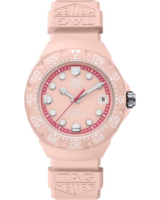 The TAG Heuer Formula 1 Solargraph Solar Quartz 38mm Watch features a pink design with a round dial, white hour markers, and a date window at the 3 o’clock position. Its pink silicone strap is accented with the TAG Heuer logo.