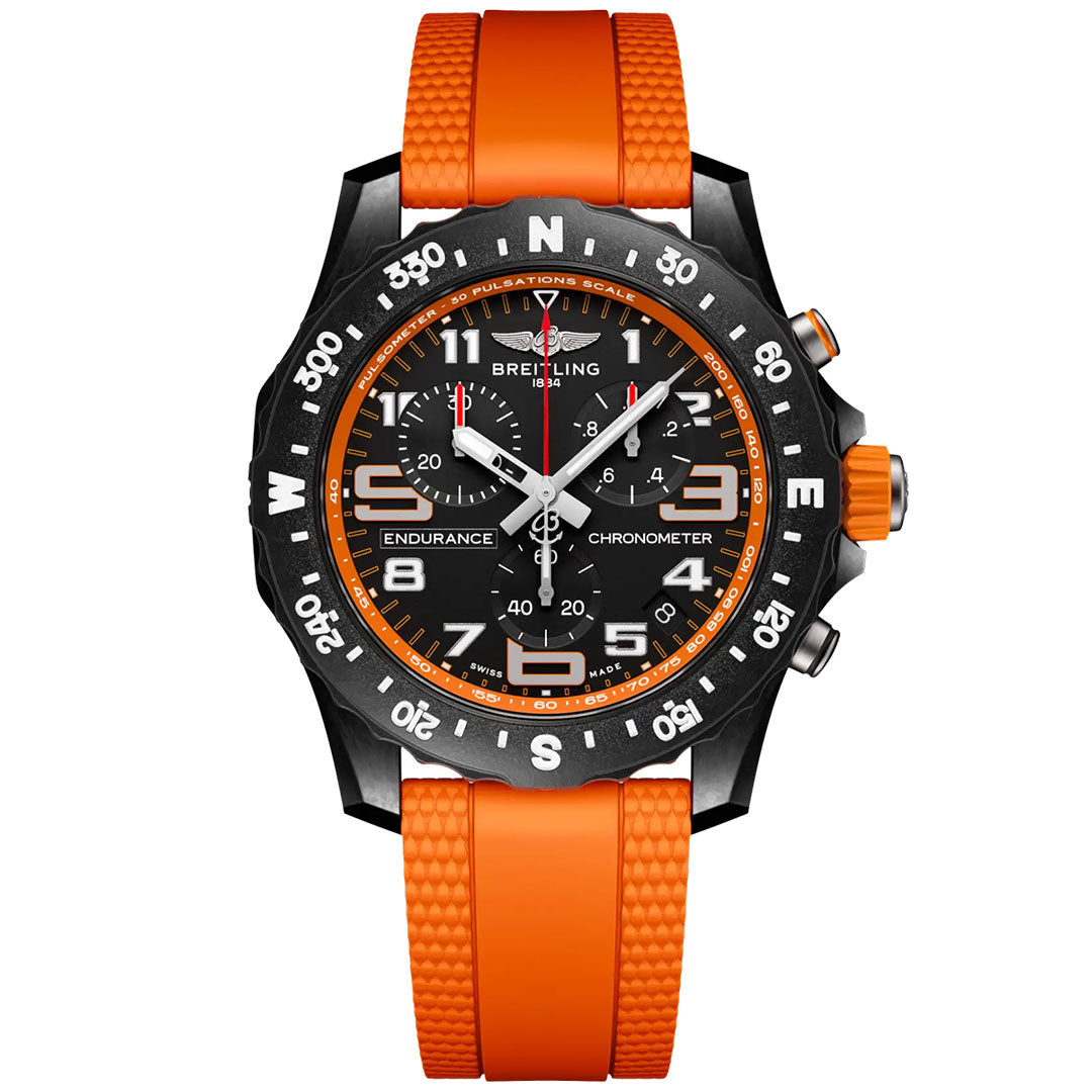The Breitling Professional Endurance Pro 44 is a sporty watch with a black dial, white markings, three subdials, an orange textured strap, and orange accents on the bezel and crown.