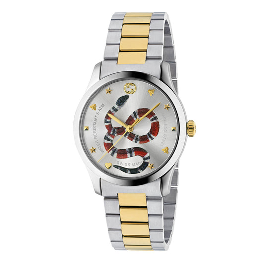 The Gucci G-Timeless Quartz 38mm Watch from GUCCI features a luxurious wristwatch design with a striking silver and gold-toned band. Its distinct dial showcases a red and black snake winding around the center, highlighted by gold star markers and small bee details. The watch elegantly presents "Swiss Made" and "Water Resistant" on the dial.