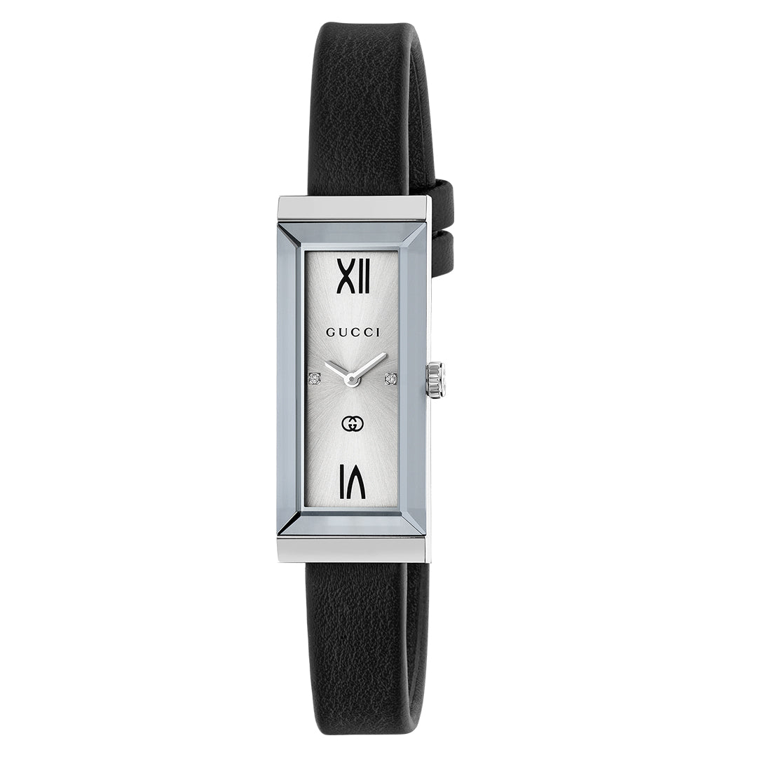 The Gucci G-Frame Quartz 14 X 34mm Watch showcases a sleek rectangular design with a silver face adorned with black Roman numerals. The face is elegantly embellished with "GUCCI" and a small logo, while the minimalist style is enhanced by a slim black leather strap, blending classic elegance with modern sophistication.