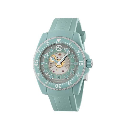 The Gucci Dive Automatic 40mm Watch from GUCCI features a captivating turquoise color with a see-through dial that showcases its mechanical interior. It is embellished with star and bee designs on the bezel, seamlessly blending elegance and functionality. The strap, made from bio-based plastic, offers an eco-friendly element to this fashionable diver's timepiece.
