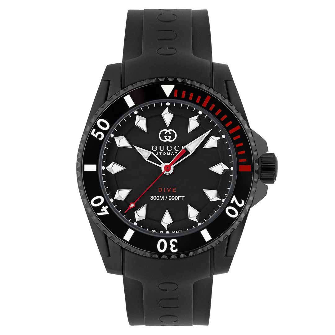 The Gucci Dive Black Automatic 40mm Watch by GUCCI features an eye-catching black dial with white geometric hour markers and hands, enhanced by a vibrant red second hand. Encased in stainless steel, it is equipped with a black rubber strap and unidirectional bezel, offering water resistance up to 300 meters or 950 feet.