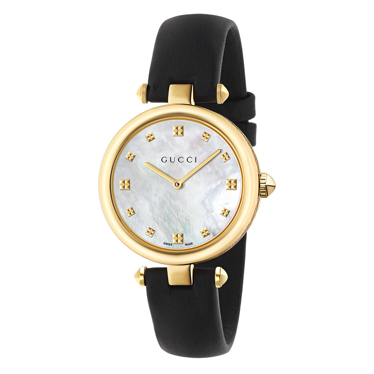 A Gucci Diamantissima Quartz 32mm watch from GUCCI Watch, featuring a gold-tone round case with a mother-of-pearl dial. It is adorned with gold hour markers embellished with pyramid motifs and complemented by a black leather strap that includes a subtle diamante pattern. The brand name is elegantly positioned below the 12 o'clock marker.