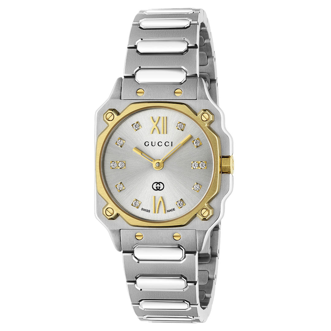 The Gucci G-Flat Quartz 24mm Watch features a two-tone stainless steel band, rectangular silver dial with diamond indexes, Roman numerals at 12 and 6, gold-plated bezel, and Gucci logo at the top.