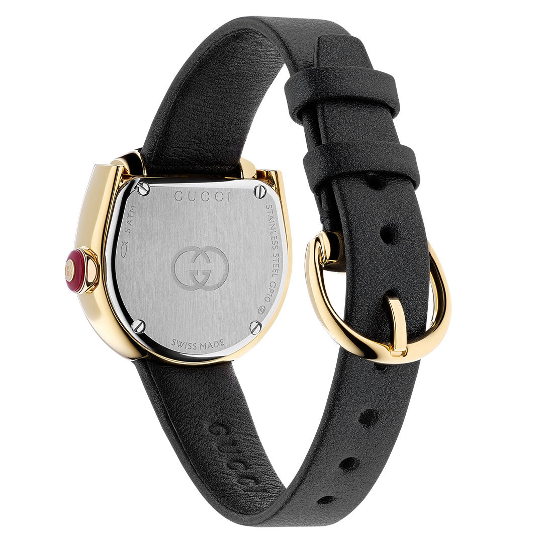 The GUCCI Horsebit Quartz 27mm x 25mm Watch features a black leather strap, gold buckle, stainless steel case back engraved with the Gucci logo and "SWISS MADE," plus a red crown on its equestrian-inspired design.