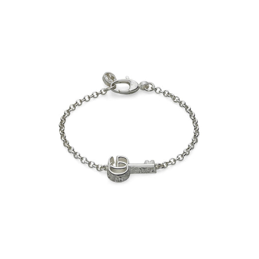 Introducing the Gucci GG Marmont Key Charm Sterling Silver Bracelet by GUCCI Fine Jewellery. This elegant piece features a Double G key and heart charm on a delicate chain with a minimalist clasp, offering an exquisite blend of sophistication and simplicity.