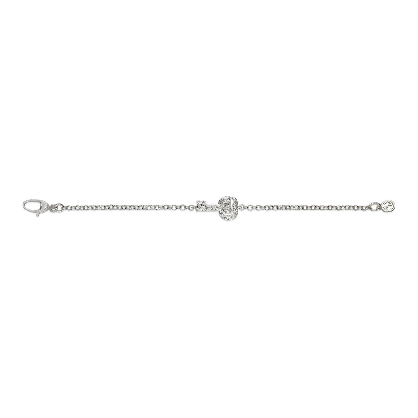 Introducing the Gucci GG Marmont Key Charm Sterling Silver Bracelet from GUCCI Fine Jewellery. This elegant bracelet showcases a fine sterling silver chain with a lobster clasp on one end and a small circular loop on the other. Its centerpiece is a heart-shaped pendant embellished with sparkling stones, offering an exquisite touch.