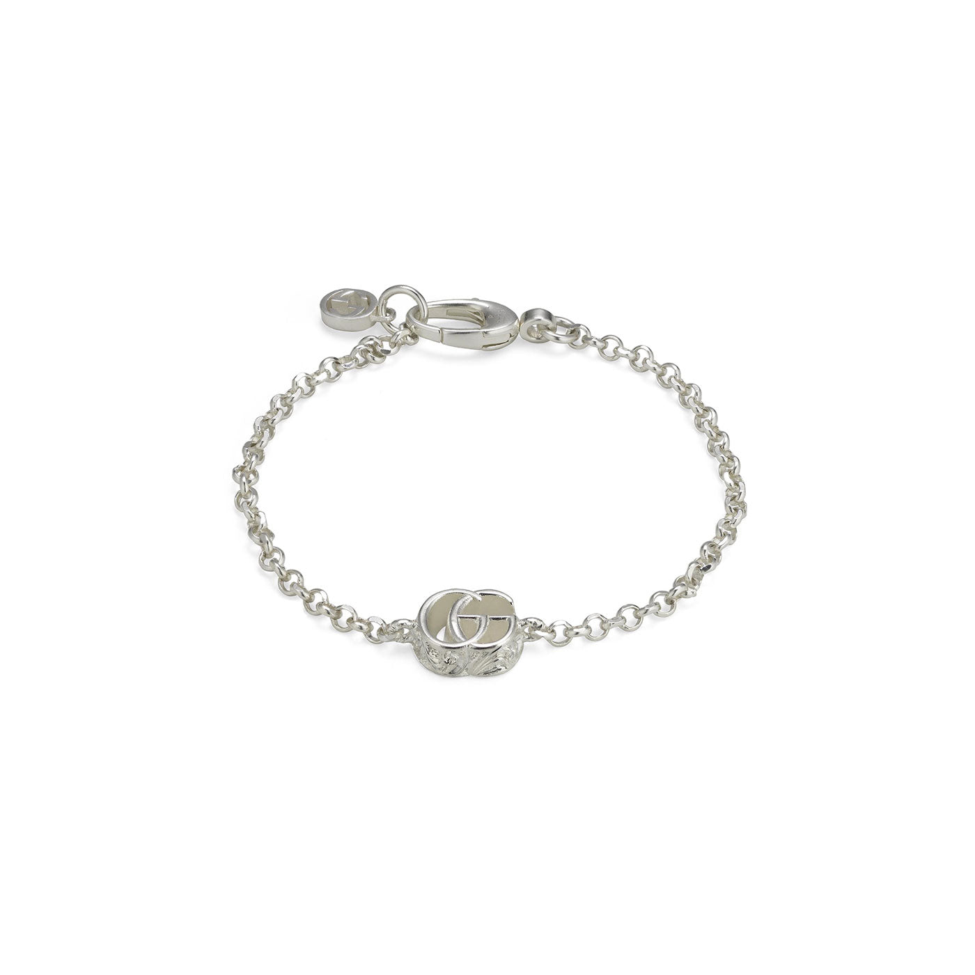 Explore the sophistication of GUCCI Fine Jewellery with the Gucci GG Marmont Charm Sterling Silver Bracelet. This 925 sterling silver chain bracelet features an iconic interlocking Double G emblem, accented with a small circular tag and a secure clasp to complete its exquisite design.