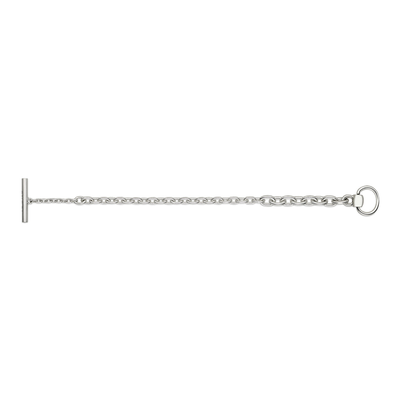 The Gucci Horsebit Chain Sterling Silver Bracelet by GUCCI Fine Jewellery, featuring a toggle closure with a T-bar on one end and a circular ring on the other, laid flat on a white background, adds an equestrian-inspired touch.