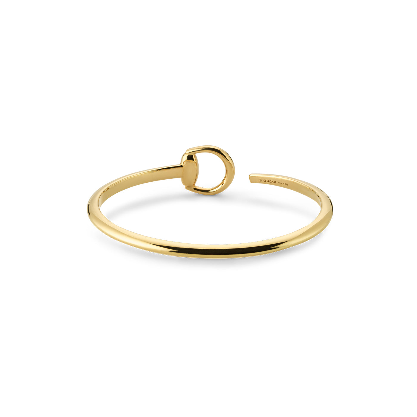 The Gucci Horsebit 18K Yellow Gold Cuff Bracelet by GUCCI Fine Jewellery highlights minimalist elegance with a simple circular clasp, set against a white background.