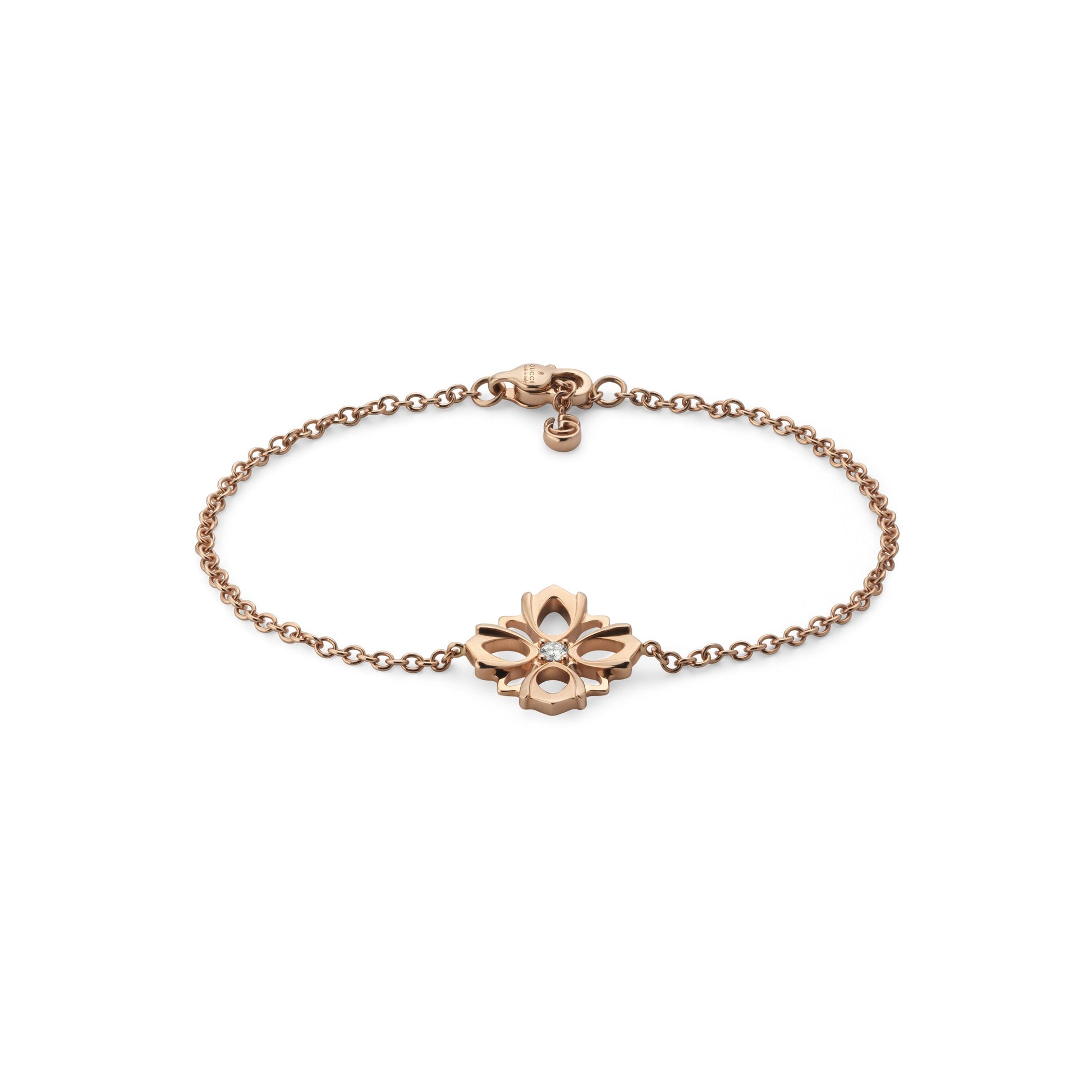 This Gucci Flora 18K Rose Gold Diamond Chain Bracelet from GUCCI Fine Jewellery boasts a delicate design with a diamond flower charm at its center, alongside a fine gold chain and clasp fastening.