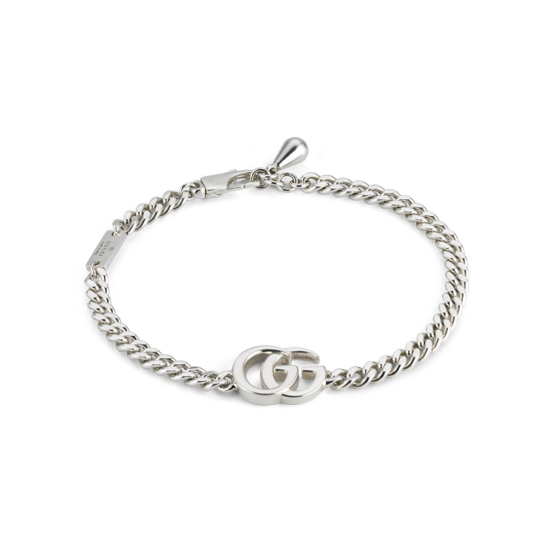 The Gucci GG Marmont Sterling Silver Chain Bracelet by GUCCI Fine Jewellery features an interlocking GG logo and a lobster clasp closure.