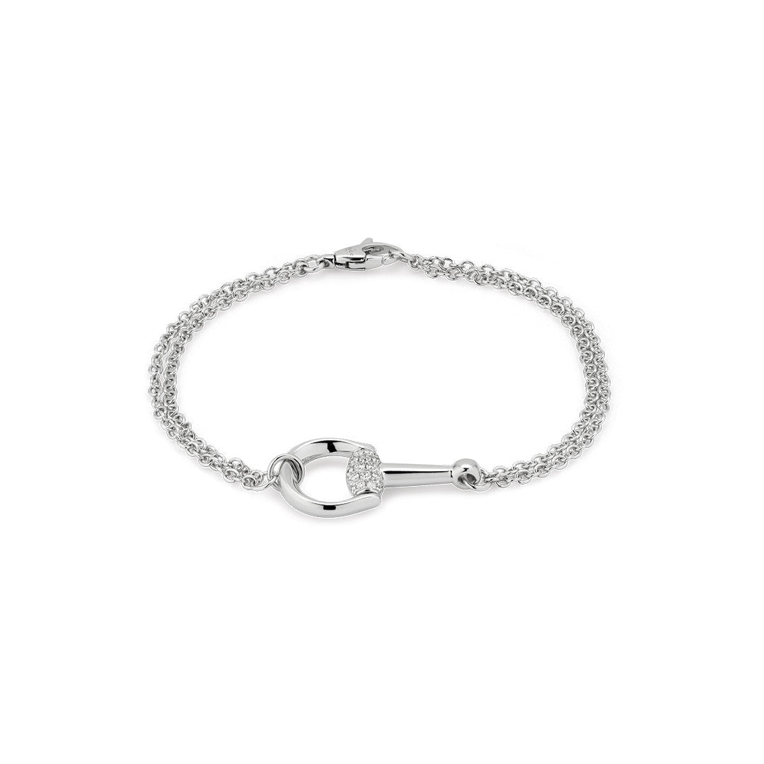 The Gucci Horsebit 18K White Gold Diamond Bracelet by GUCCI Fine Jewellery features a double chain and a key-shaped pavé diamond charm, beautifully displayed on a white background.