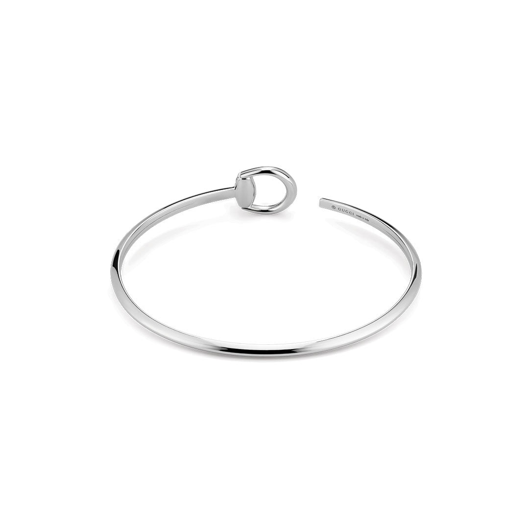 The Gucci Horsebit 18K White Gold Diamond Cuff Bracelet by GUCCI Fine Jewellery features a minimalist polished design with a signature loop detail, shown on a plain white background.